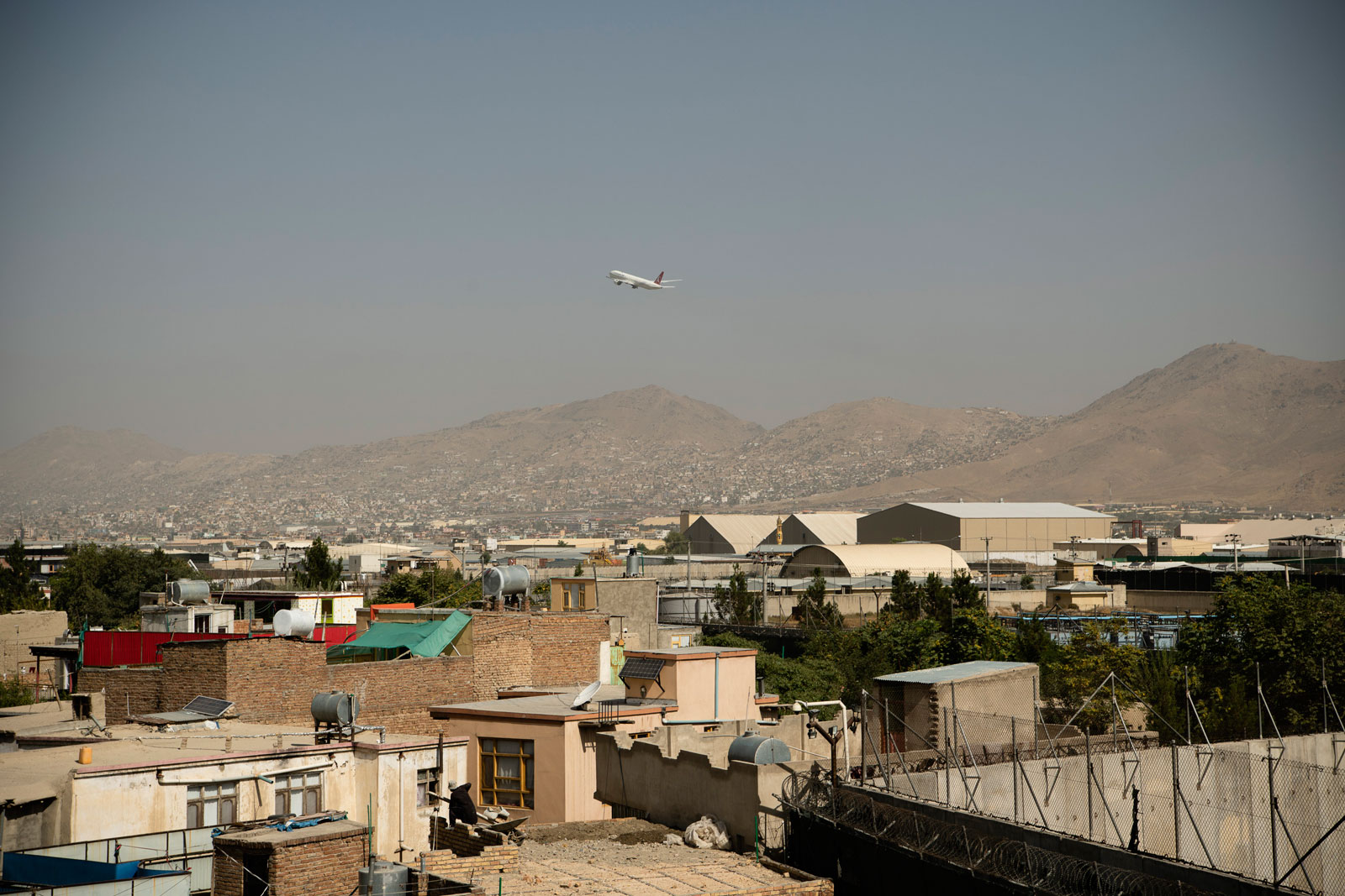 A plane leaves the Hamid Karzai International Airport in Kabul on August 15.