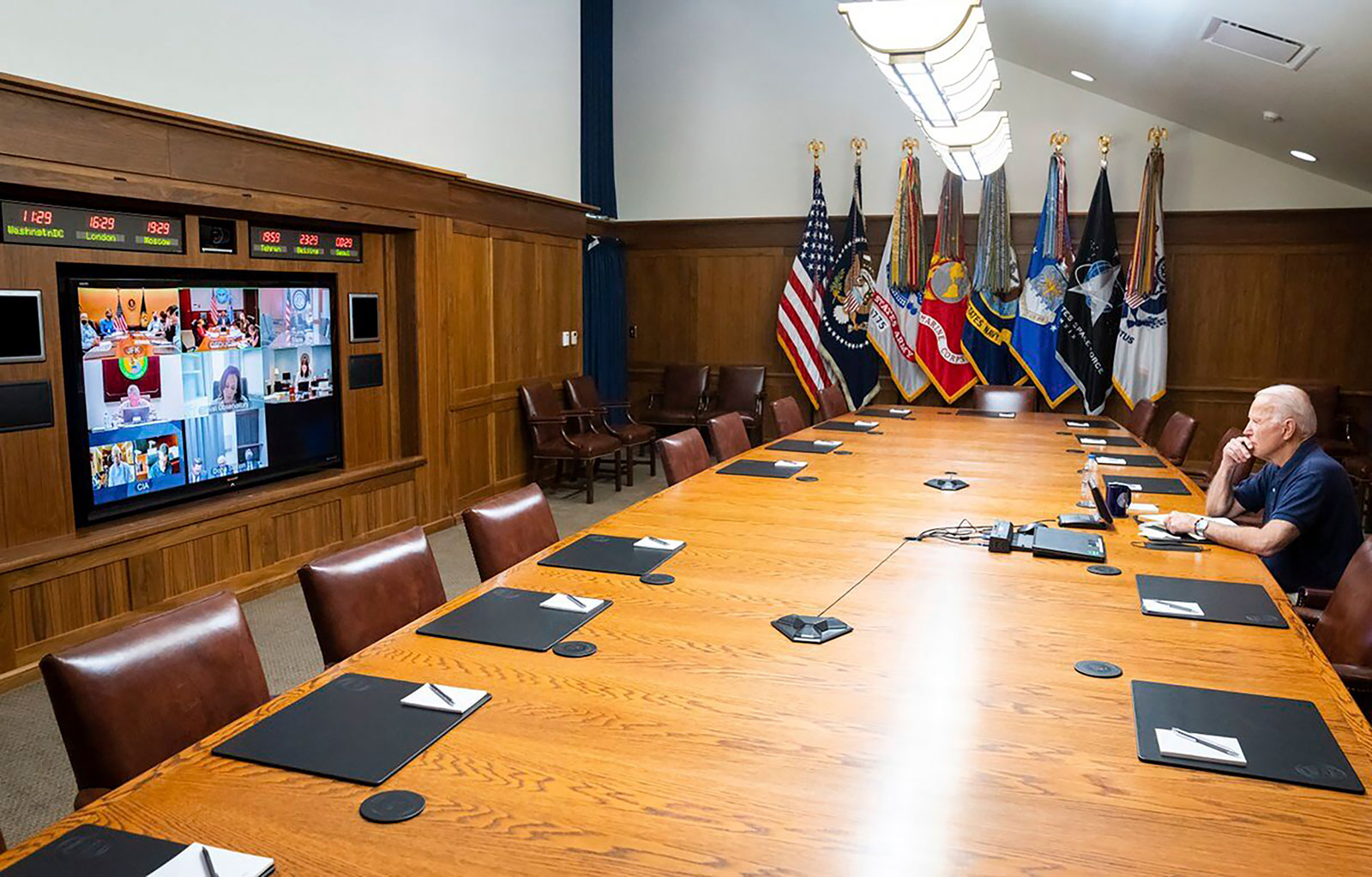 President Joe Biden meets virtually with his national security team for a briefing on Afghanistan at Camp David on Sunday, August 15.
