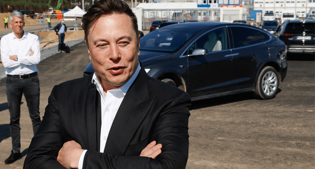 In this file photo Tesla CEO Elon Musk talks to media as he arrives to visit the construction site of the future US electric car giant Tesla in Gruenheide near Berlin on September 3, 2020. Odd ANDERSEN / AFP