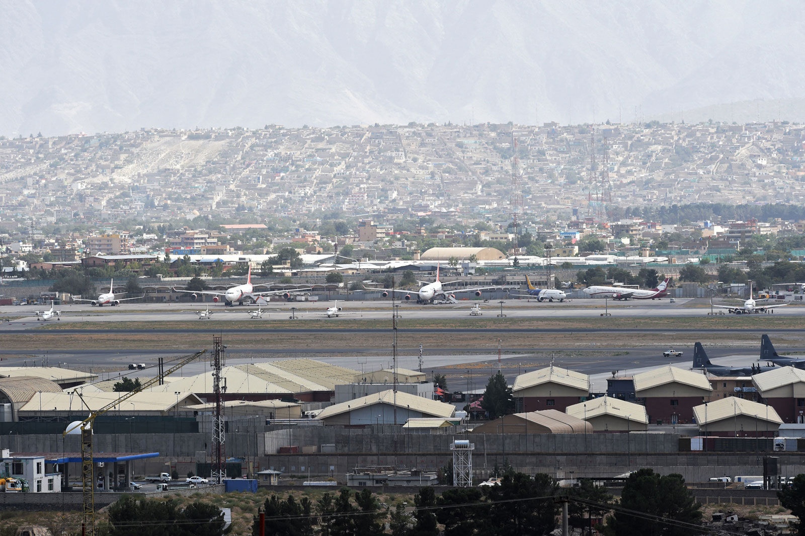 Aircraft are seen on the tarmac of Hamid Karzai International Airport in Kabul on August 14.