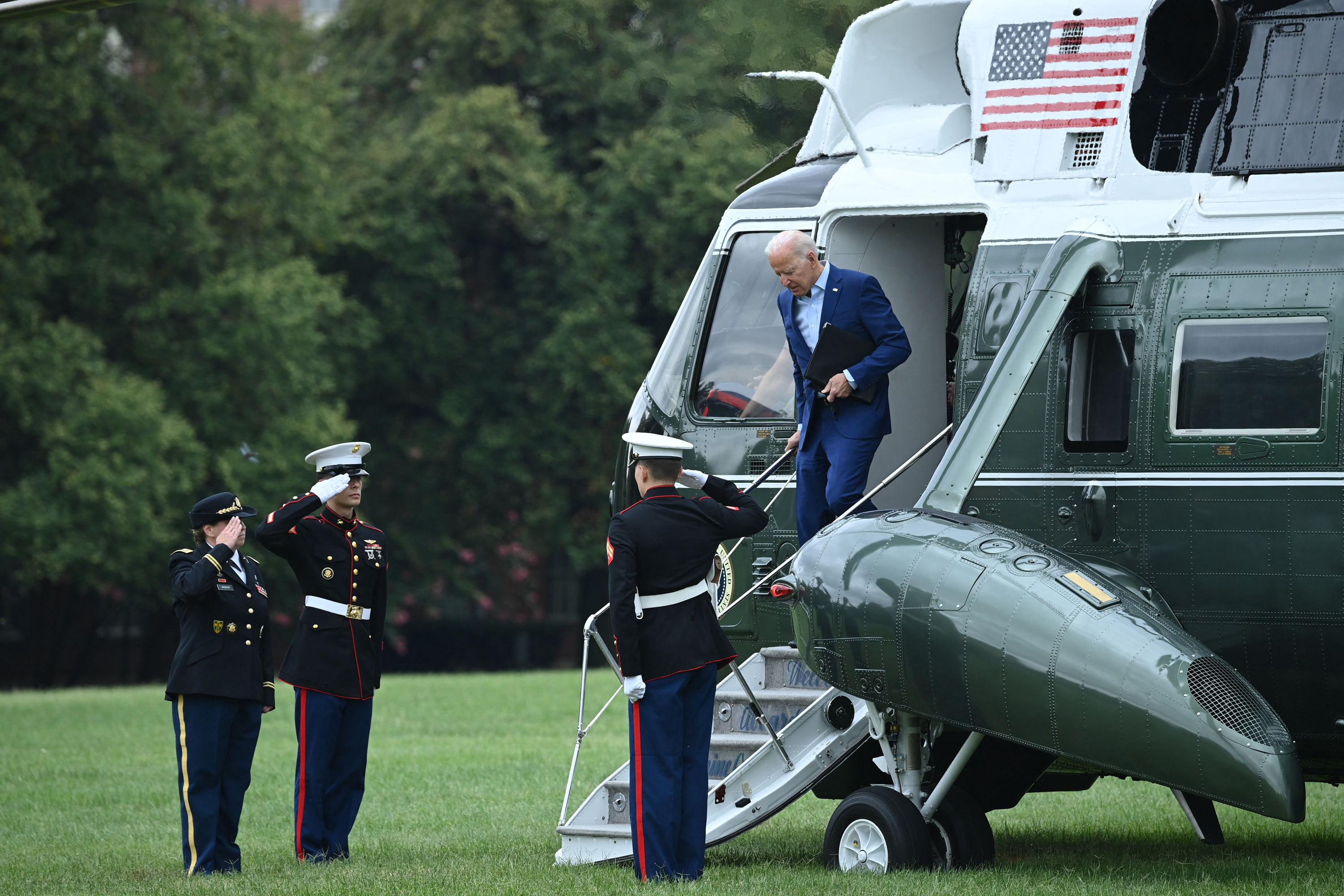 President Joe Biden steps off Marine One as he arrives at Fort McNair in Washington, DC, on August 16.