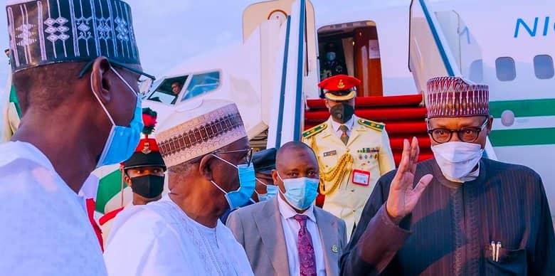 Buhari, aides take Covid-19 tests after arrival from UK